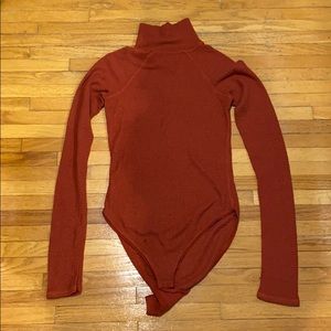 Free people burnt orange turtleneck bodysuit